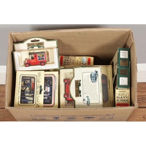 241 - A large quantity of 70+ assorted boxed model vehicles, most examples from Lledo 