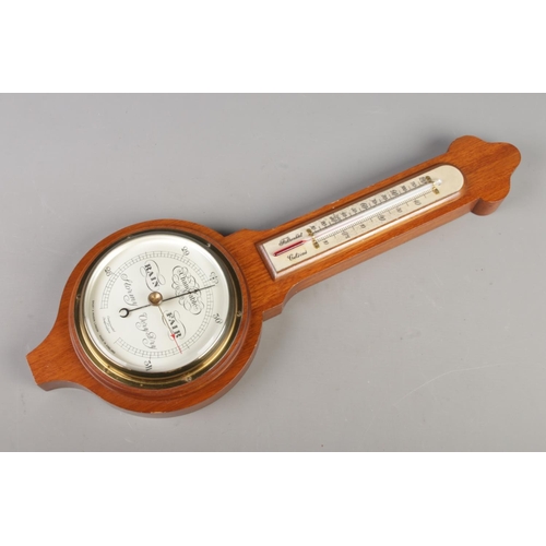 290 - A vintage mahogany barometer with thermometer by 