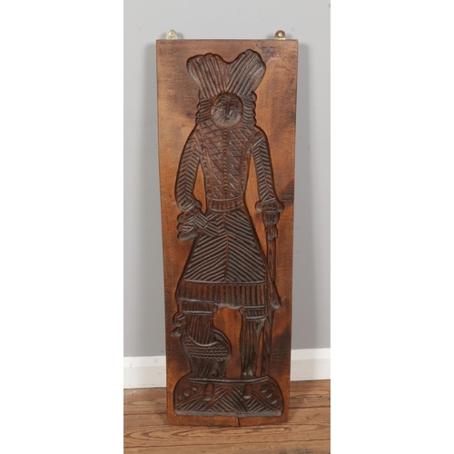 292 - An antique carved solid wooden gingerbread mould, handcrafted with figures in traditional clothing, ... 