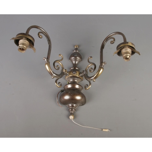 307 - A pair of vintage Italy brass wall lights with stylised foliate design, together with a pair of smal... 