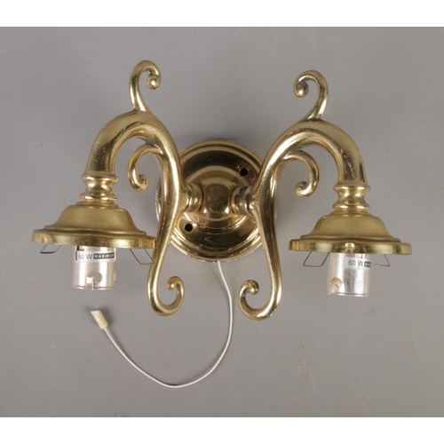 307 - A pair of vintage Italy brass wall lights with stylised foliate design, together with a pair of smal... 