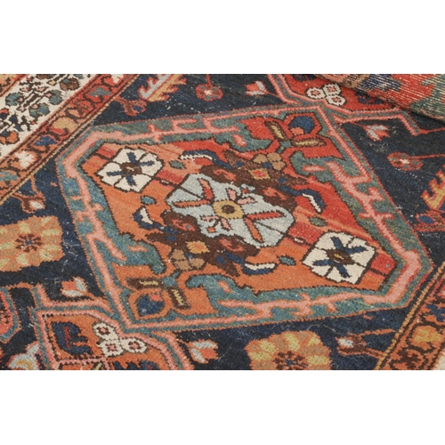 309 - A vintage Persian ground runner, size L307 x W113cm.