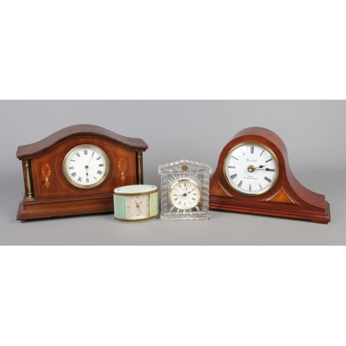 60 - Four vintage clocks, comprising an Edwardian French mahogany clock with inlaid detailing, Canadian 