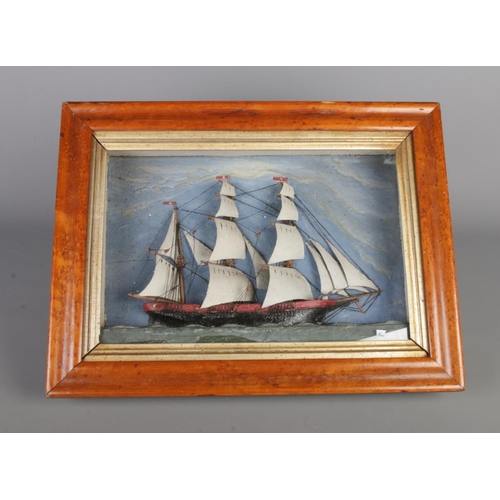 62 - A 19th century sailing diorama, housed in a maple frame with glass, measuring H32 cm x W42 x D7.5 cm... 