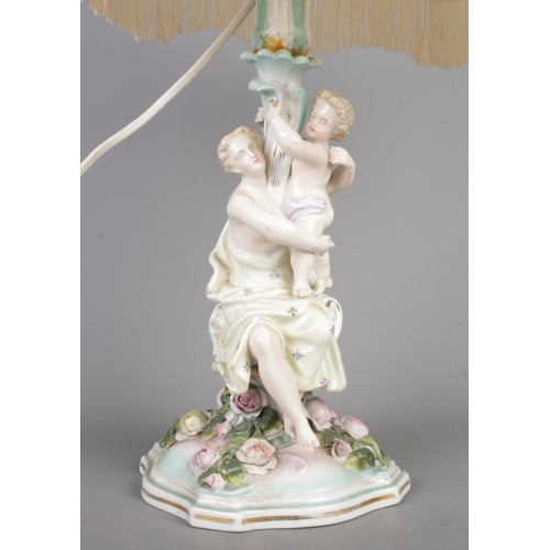 64 - A Victorian Meissen style porcelain table lamp, with hand painted decoration, height 55cm.