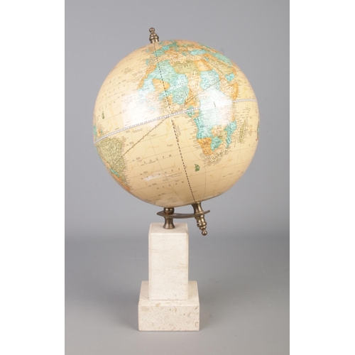 69 - A George F Cram Imperial World Globe on marble stand. Height 42cm.