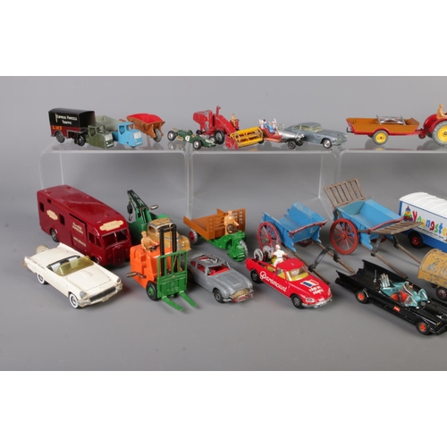 224 - A box of assorted die-cast vehicles and accessories. To include Corgi, Dinky Toys, Budgie Toys, Lesn... 