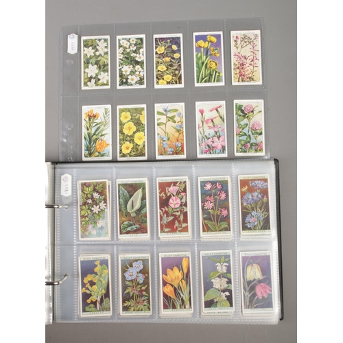 39 - One folder containing ten complete sets of 50 Wills's Cigarette Cards. Do You Know? 1st, 2nd and 3rd... 