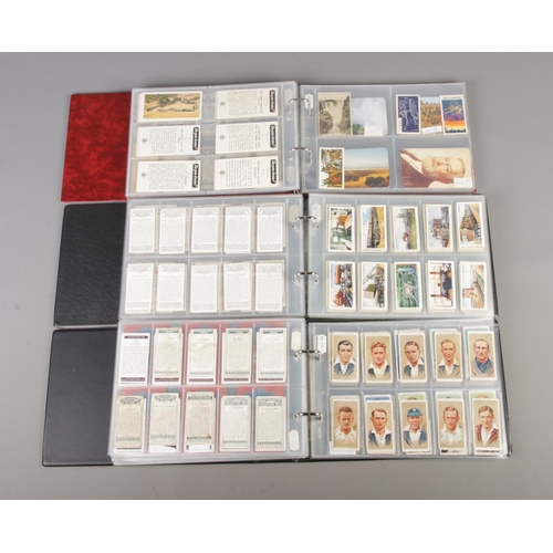 49 - Three albums of part sets of Cigarette and collectors cards, containing Motor Cars, Engineering Wond... 