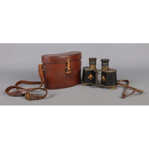 7 - A pair of Ross, London Stereo Prism Binoculars (Power = 6), bearing military broad arrow marks to th... 