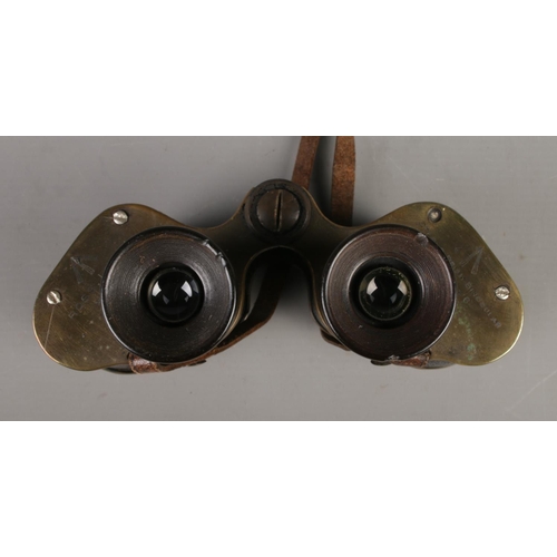 7 - A pair of Ross, London Stereo Prism Binoculars (Power = 6), bearing military broad arrow marks to th... 