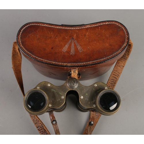 7 - A pair of Ross, London Stereo Prism Binoculars (Power = 6), bearing military broad arrow marks to th... 