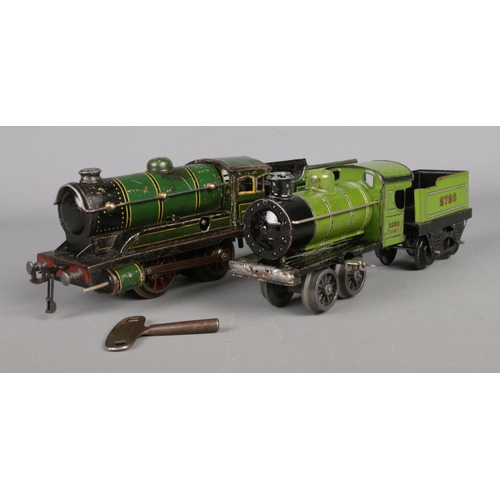 494 - Two clockwork locomotives with tender. Hornby 2526 with 2728 wagon and another example in green live... 