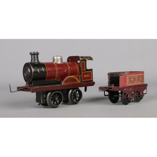 495 - A Bing 'O' Gauge clockwork locomotive, with tender. In brown livery, stamped for 2631 and Midlands R... 