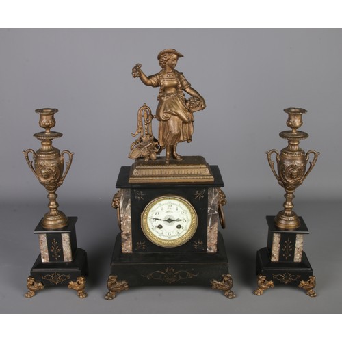 4 - A 19th century French made mantle clock with spelter decoration to top with matching slate and marbl... 