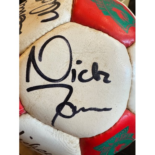 14 - A signed Liverpool FC 100 years centenary football featuring players such as Ian Rush, Bruce Grobbel... 