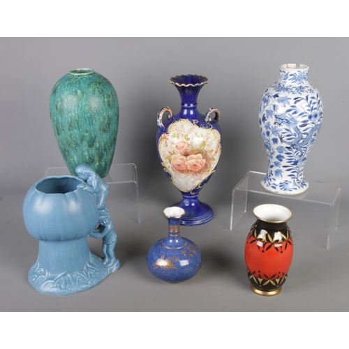 76 - Six porcelain vases, including a early 20th century Kangxi mark Chinese blue & white dragon baluster... 