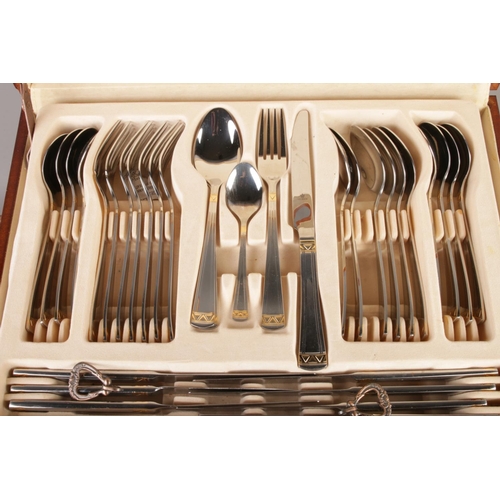 18 - A SBS Solingen gold and silver plated canteen of cutlery with two drawers.