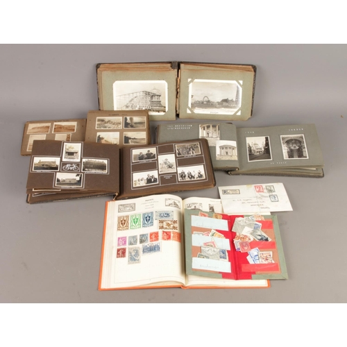 42 - A mixed collection of vintage photograph albums, stamp album and a quantity of used and unused postc... 