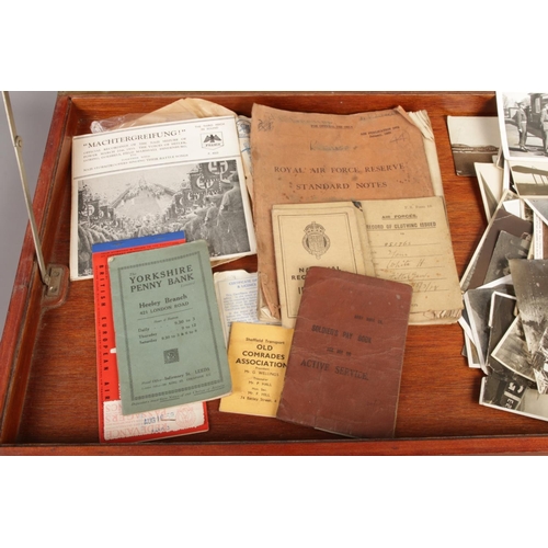 47 - A vintage military collection in a wooden display case, including a cased collection of I.S.T.D badg... 