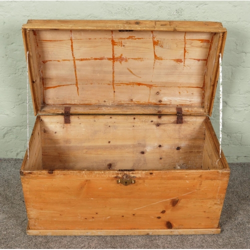 383 - An antique pine blanket chest, has dome top with new brass handles. Size W95 x D57 x H57cm.