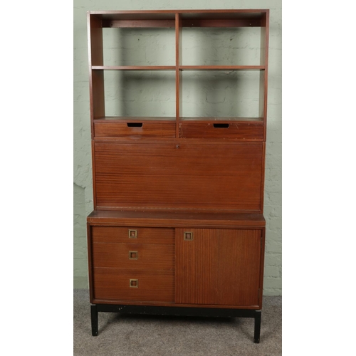 396 - A Wrightons teak three sectional unit with drawers, drinks cabinet and shelving 

Hx187cm
Wx99cm
Dx4... 