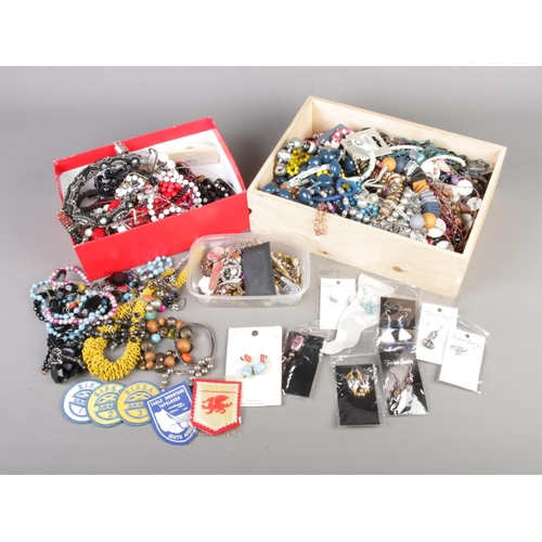 11 - Two boxes of assorted costume jewellery and accessories to include bracelets, necklaces, earrings, c... 