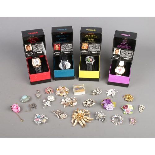 15 - Four 'Whatever It Takes' wristwatches, together with a quantity of costume jewellery, mainly brooche... 