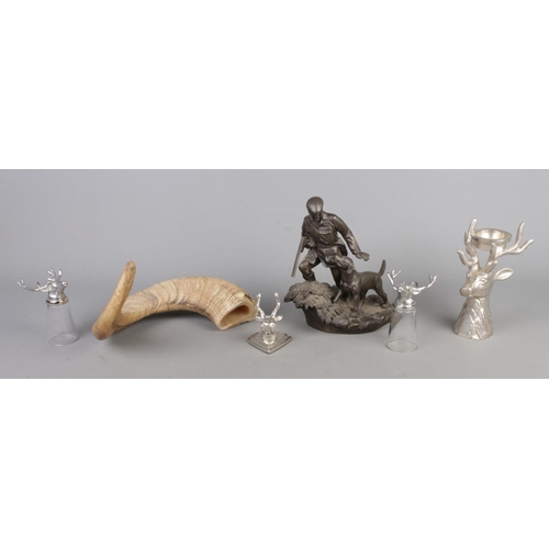 17 - A collection of hunting related items, to include stirrup cups, piece of horn and bronzed Tom Mackie... 