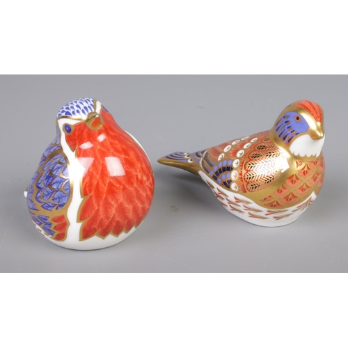 413 - Two Royal Crown Derby bird paperweight, Robin with silver stopper and Linnet with gold stopper.