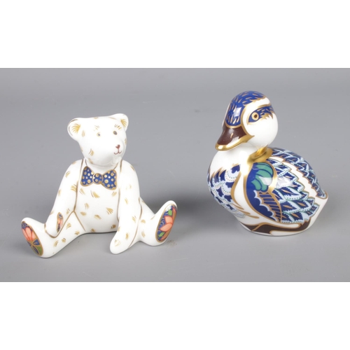 415 - Two Royal Crown Derby paperweights to include small blue duckling with silver stopper and waving ted... 