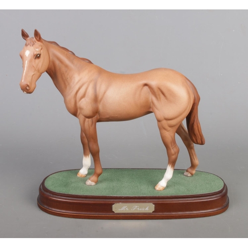 8 - A Royal Doulton figure of Thoroughbred racehorse 'Mr. Frisk' raised on plinth base. Approx. height 2... 