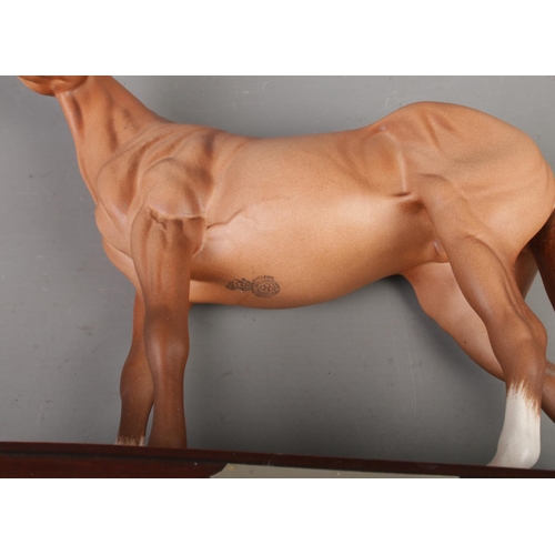 8 - A Royal Doulton figure of Thoroughbred racehorse 'Mr. Frisk' raised on plinth base. Approx. height 2... 