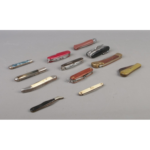 445 - Twelve assorted folding knives, including Wilkinson Sword, Richards of Sheffield and multi-tool exam... 