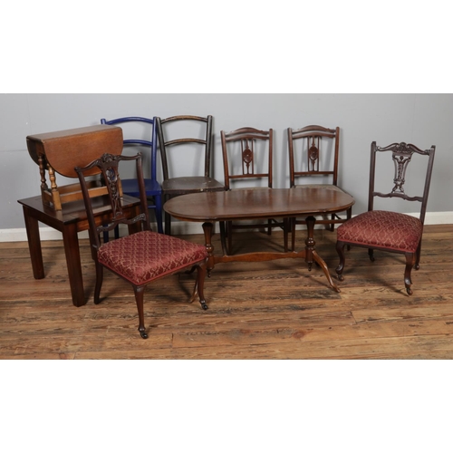 457 - A collection of assorted furniture to include pair of Edwardian inlaid chairs along with a quarter v... 