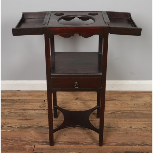 472 - A two tier mahogany washstand featuring hinged lid and single drawer. Approx. dimensions 36cm x 35cm... 