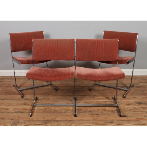 486 - A set of four Merrow Associates chromed dining chairs, model 167, with fabric seat back and base.