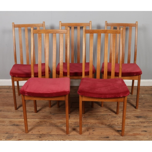 487 - Five vintage teak dining chairs, with fabric seat base.