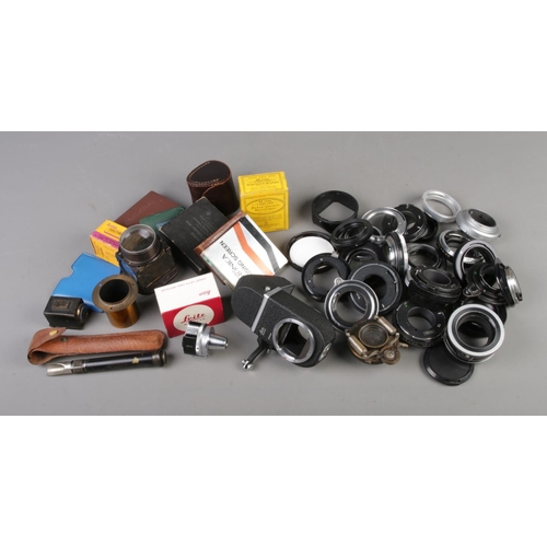 19 - A quantity of photography camera accessories including a Leitz viewfinder, Leitz Visoflex II Reflex ... 