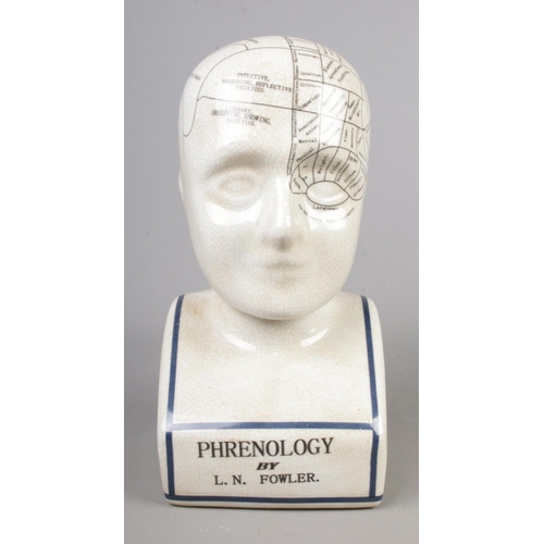 24 - A L.N. Fowler ceramic phrenology head. Height: 29cm.