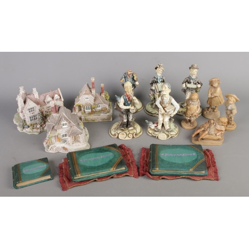 27 - Three Lilliput Lane cottages with assorted ceramic figurines and ornaments.