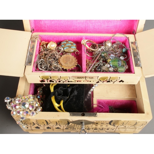 38 - Two full costume jewellery boxes containing necklaces, earrings, quartz watch, bracelets, pendants a... 