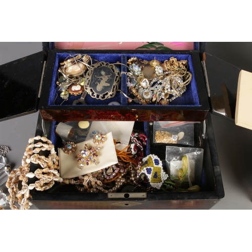 38 - Two full costume jewellery boxes containing necklaces, earrings, quartz watch, bracelets, pendants a... 