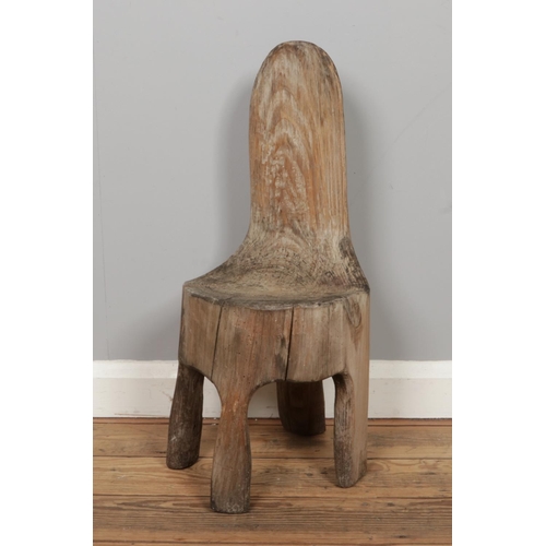 254 - A vintage tree trunk chair. Size: W29 x D32 x H65cm.