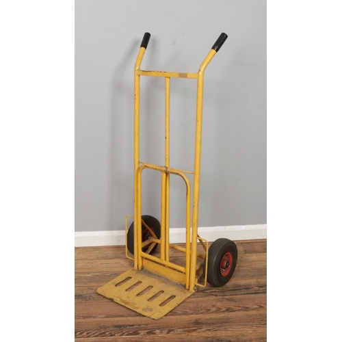 256 - A heavy duty sack barrow in yellow painting. Size: W60 x D60 x H130cm.