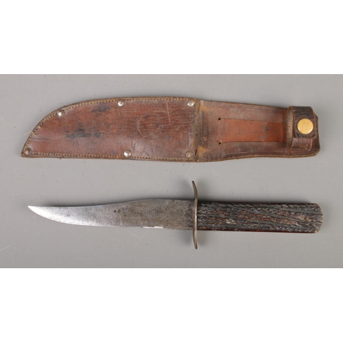 422 - An Edwardian Hunting Knife, the steel blade stamped 