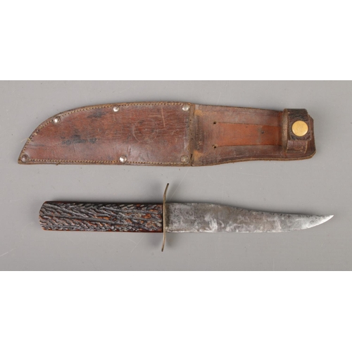 422 - An Edwardian Hunting Knife, the steel blade stamped 