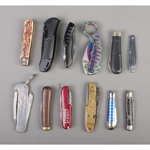 443 - A collection of pocket knives. Includes Anglo Arms, Jungle Formula, Richards Shefield, Kombat Tactic... 