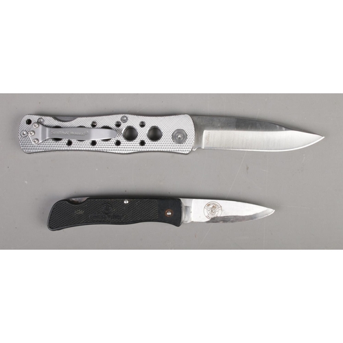 446 - Two Smith & Wesson pocket knives including a ExtremeOps and a Scrimshaw example. CANNOT POST.