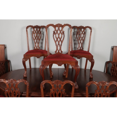 459 - A substantial mahogany ball and claw dining table with two additional leaves and set of ten chairs i... 